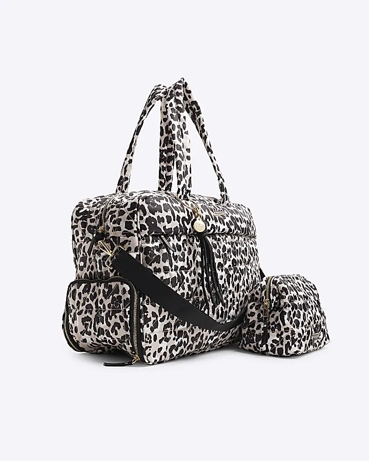 Beige quilted leopard travel and makeup bag